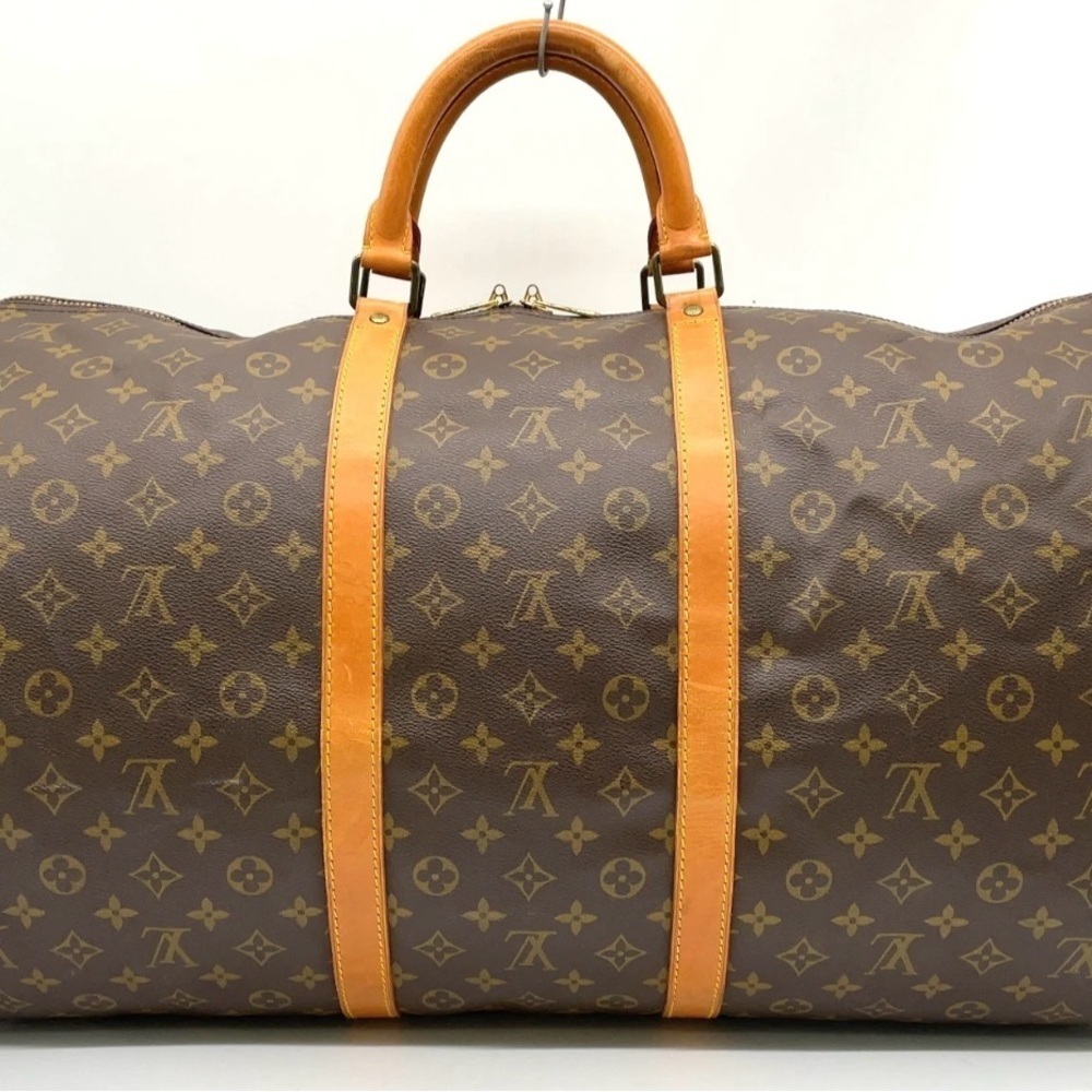 Auth Louis Vuitton Monogram Keepall
60 Boston Bag W/PadLock/Tag